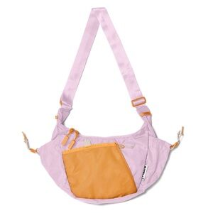 Pink crossbody bag in og packagin, selling cuz it doesn’t fit all of my stuff.